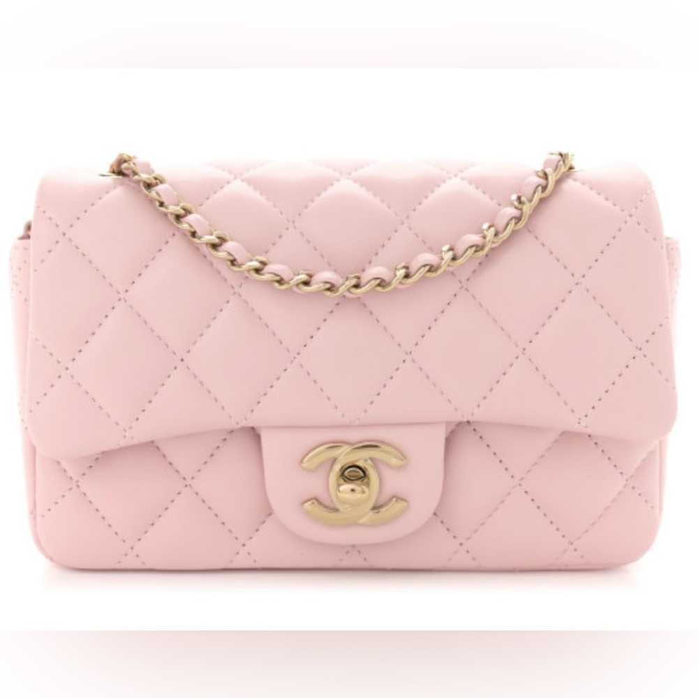 CHANEL
Lambskin Quilted Extra Mini Rectangular
Flap Light Pink!